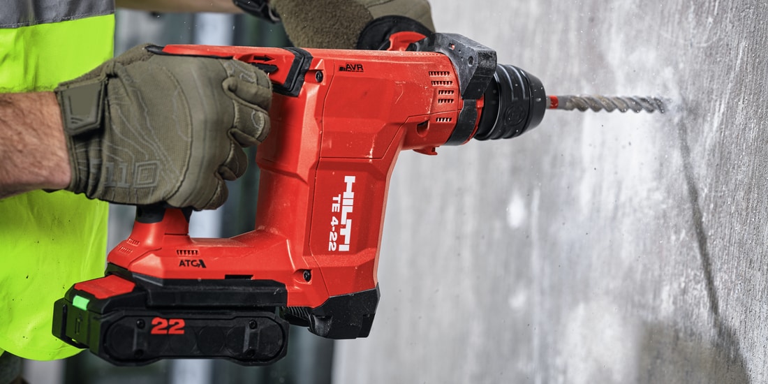 Construction worker using a TE 60-A36 Cordless combihammer with Active Torque Control (ATC) to help prevent kickback